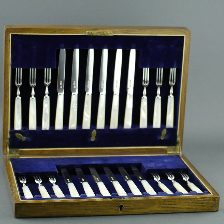 Antique 1925 Sheffield solid silver set of twelve forks and knives with Nacre handles