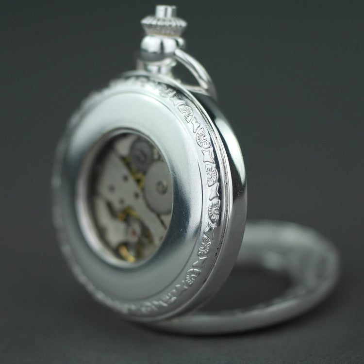 Silver plated pocket watch with Roman numbers and day and night indicator