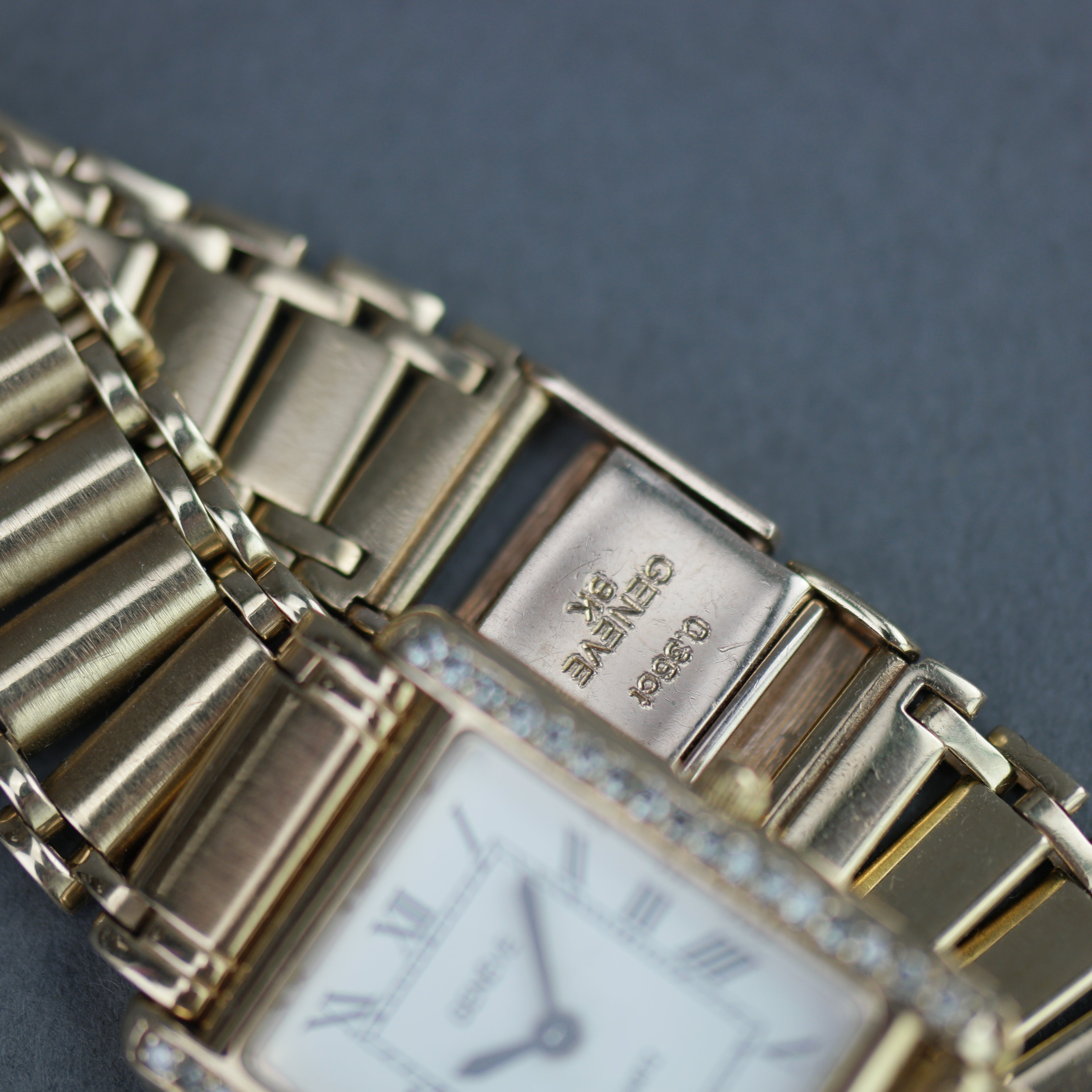 Geneve Ladies Solid 9ct Gold wristwatch - Diamond Bezel - Sapphire Crystal - Roman Dial - UK Hallmarked