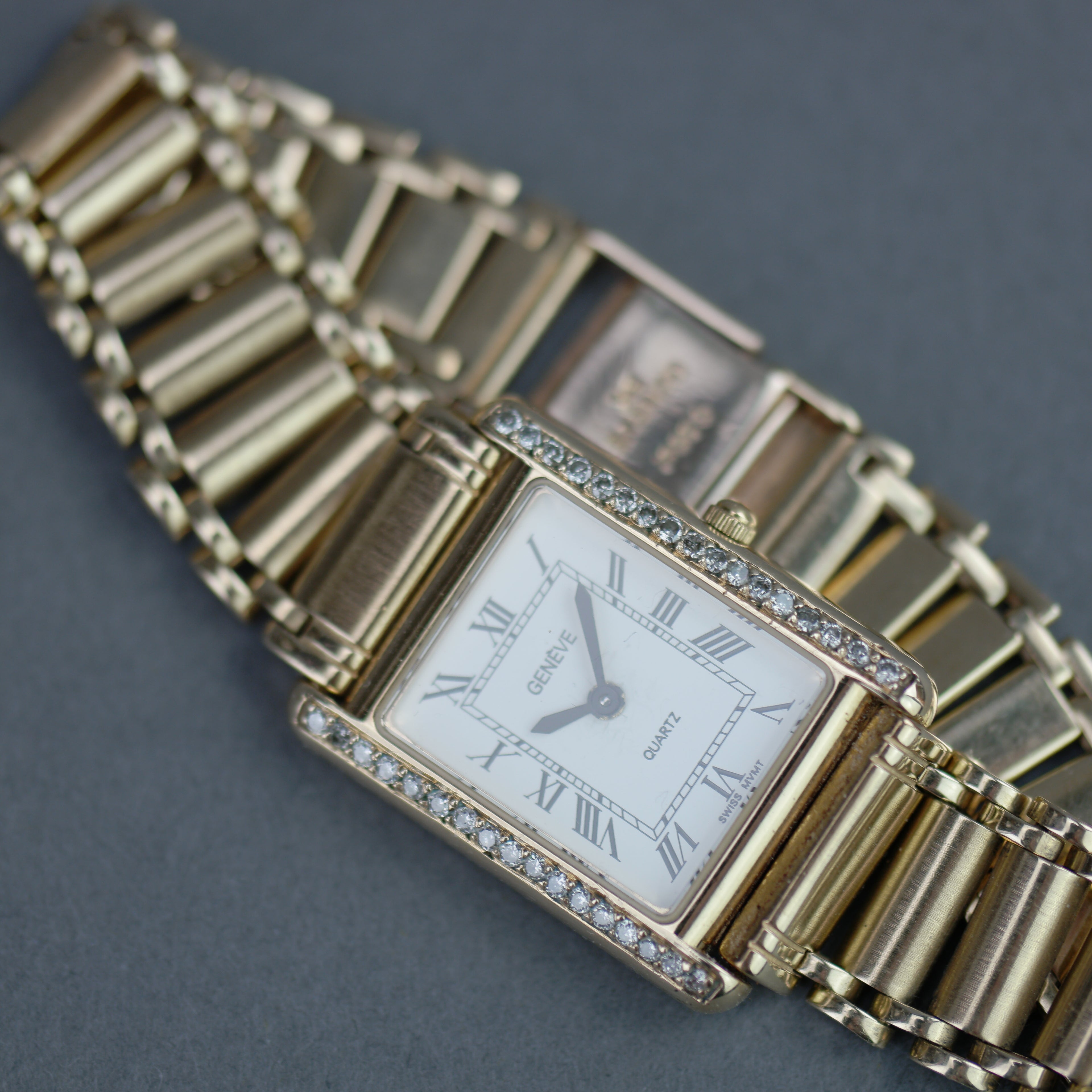 Geneve Ladies Solid 9ct Gold wristwatch - Diamond Bezel - Sapphire Crystal - Roman Dial - UK Hallmarked
