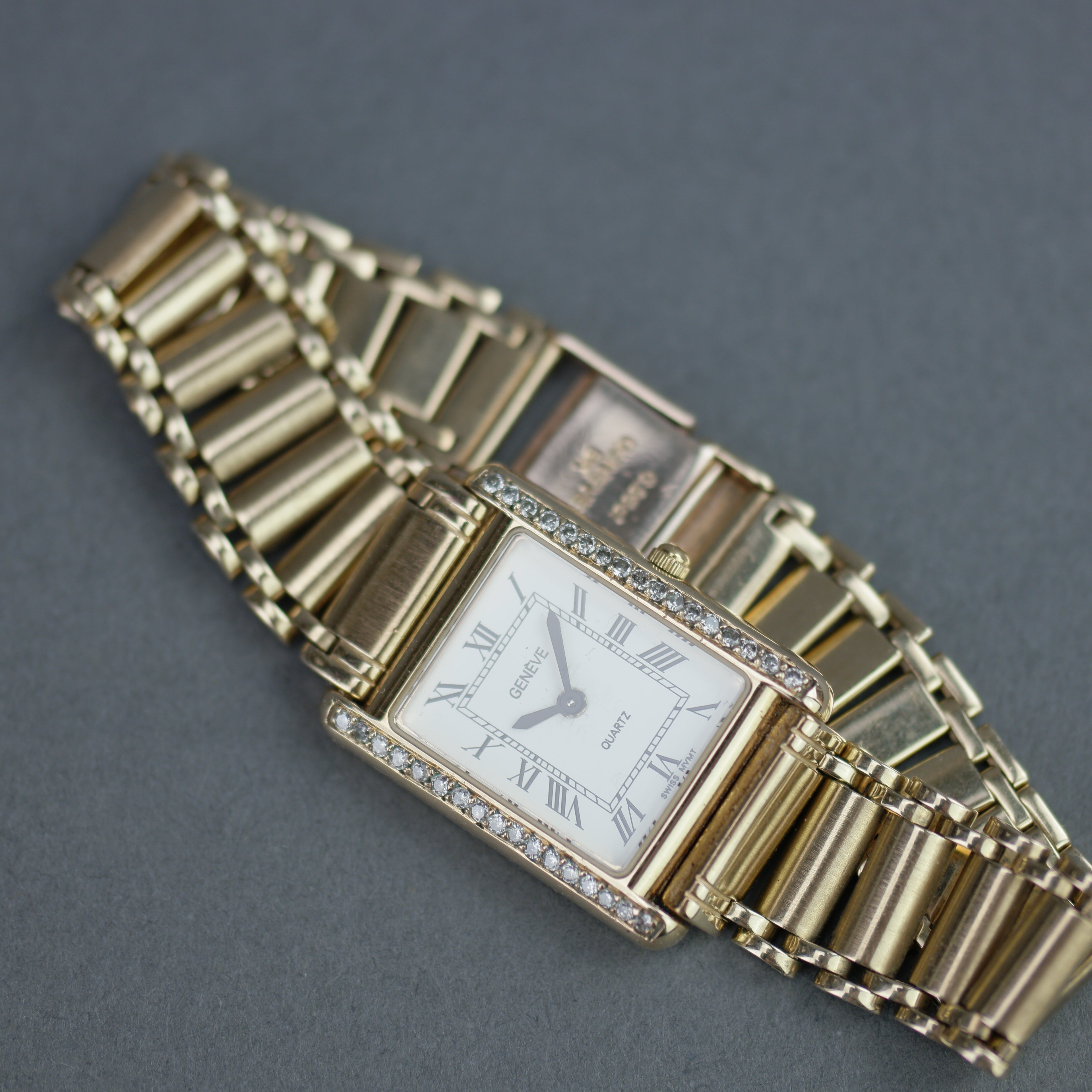 Geneve Ladies Solid 9ct Gold wristwatch - Diamond Bezel - Sapphire Crystal - Roman Dial - UK Hallmarked