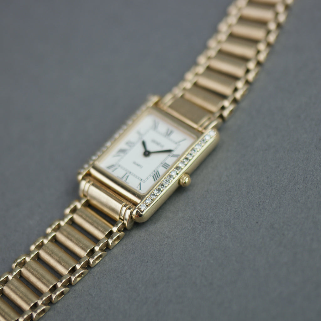 Geneve Ladies Solid 9ct Gold wristwatch - Diamond Bezel - Sapphire Crystal - Roman Dial - UK Hallmarked