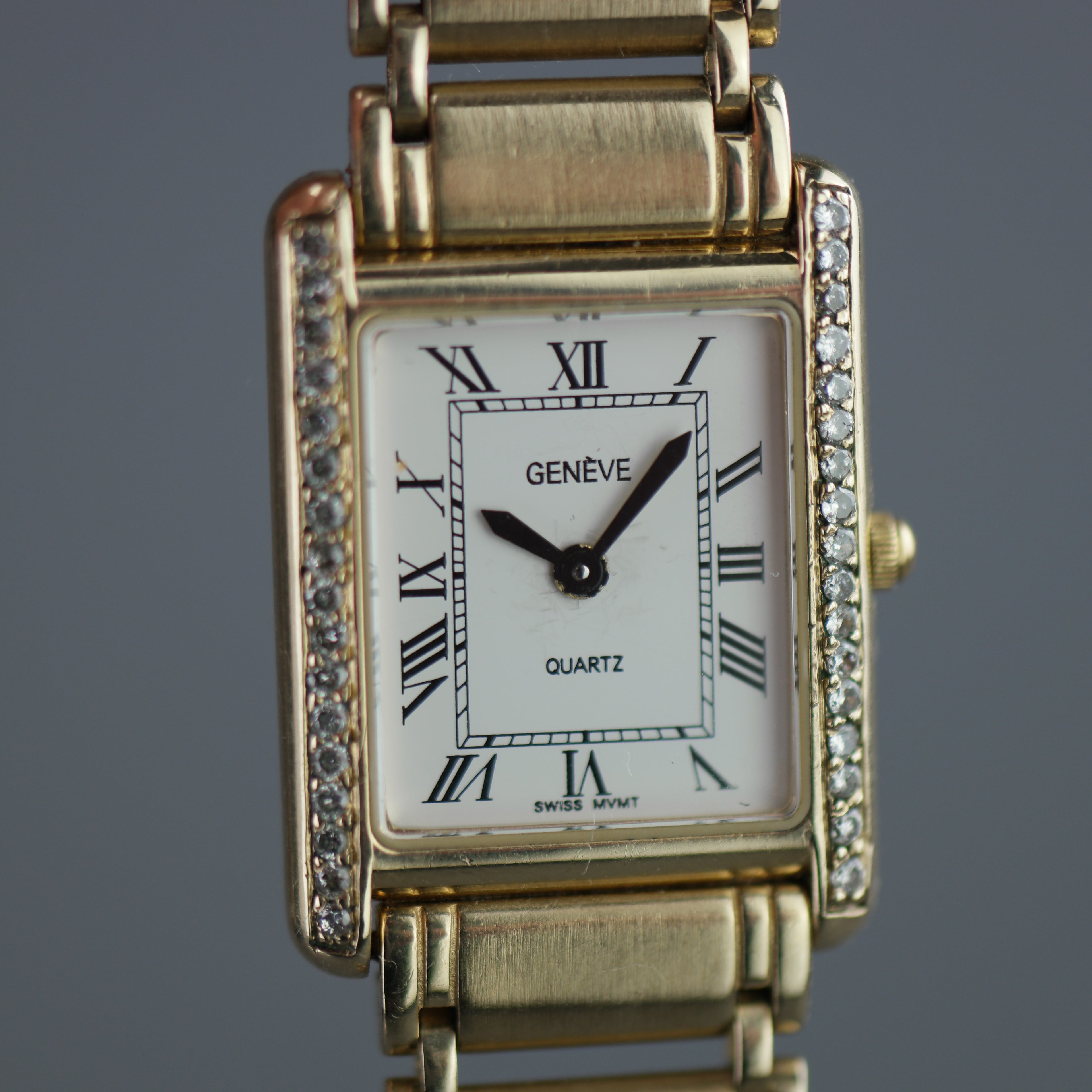 Geneve Ladies Solid 9ct Gold wristwatch - Diamond Bezel - Sapphire Crystal - Roman Dial - UK Hallmarked