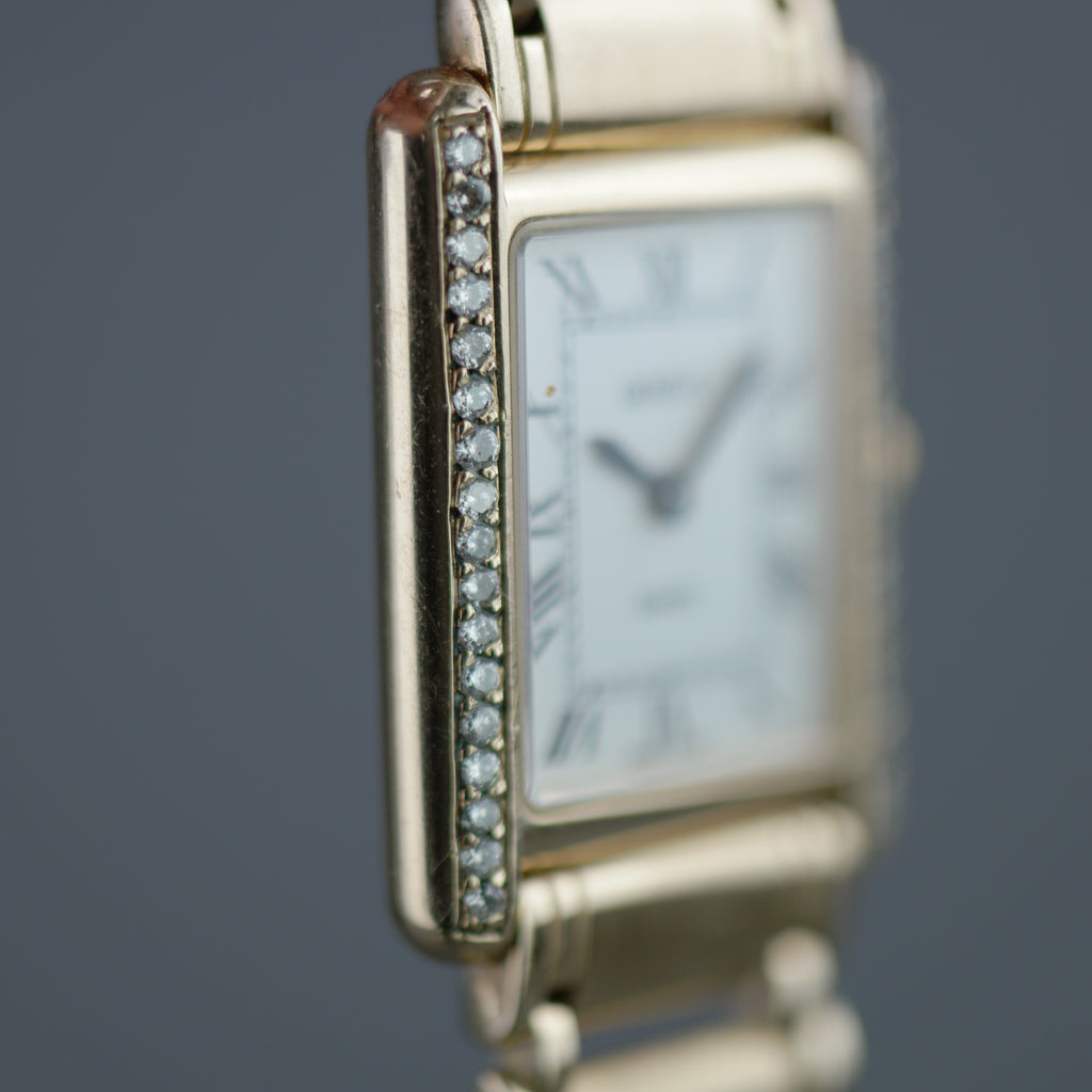 Geneve Ladies Solid 9ct Gold wristwatch - Diamond Bezel - Sapphire Crystal - Roman Dial - UK Hallmarked