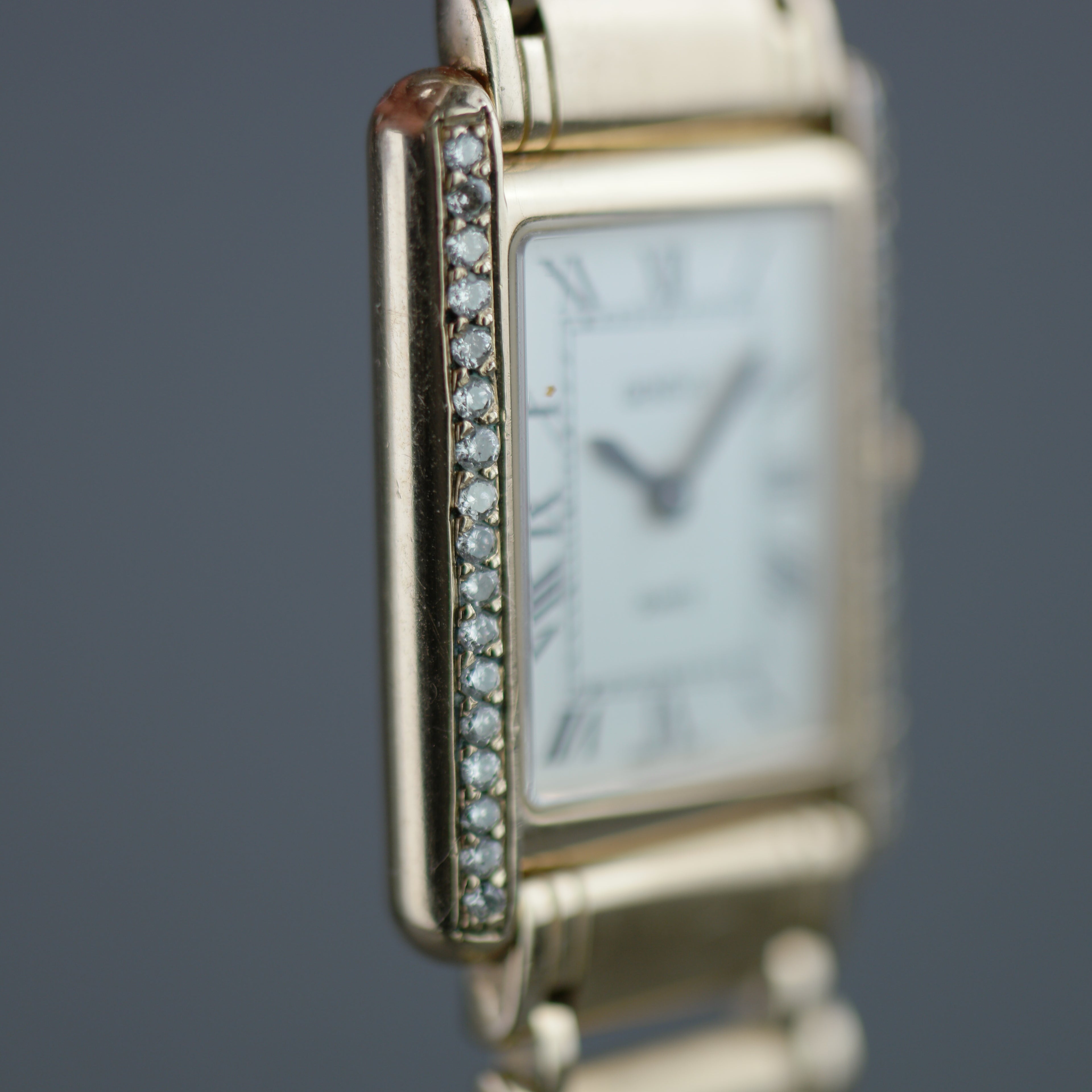 Geneve Ladies Solid 9ct Gold wristwatch - Diamond Bezel - Sapphire Crystal - Roman Dial - UK Hallmarked
