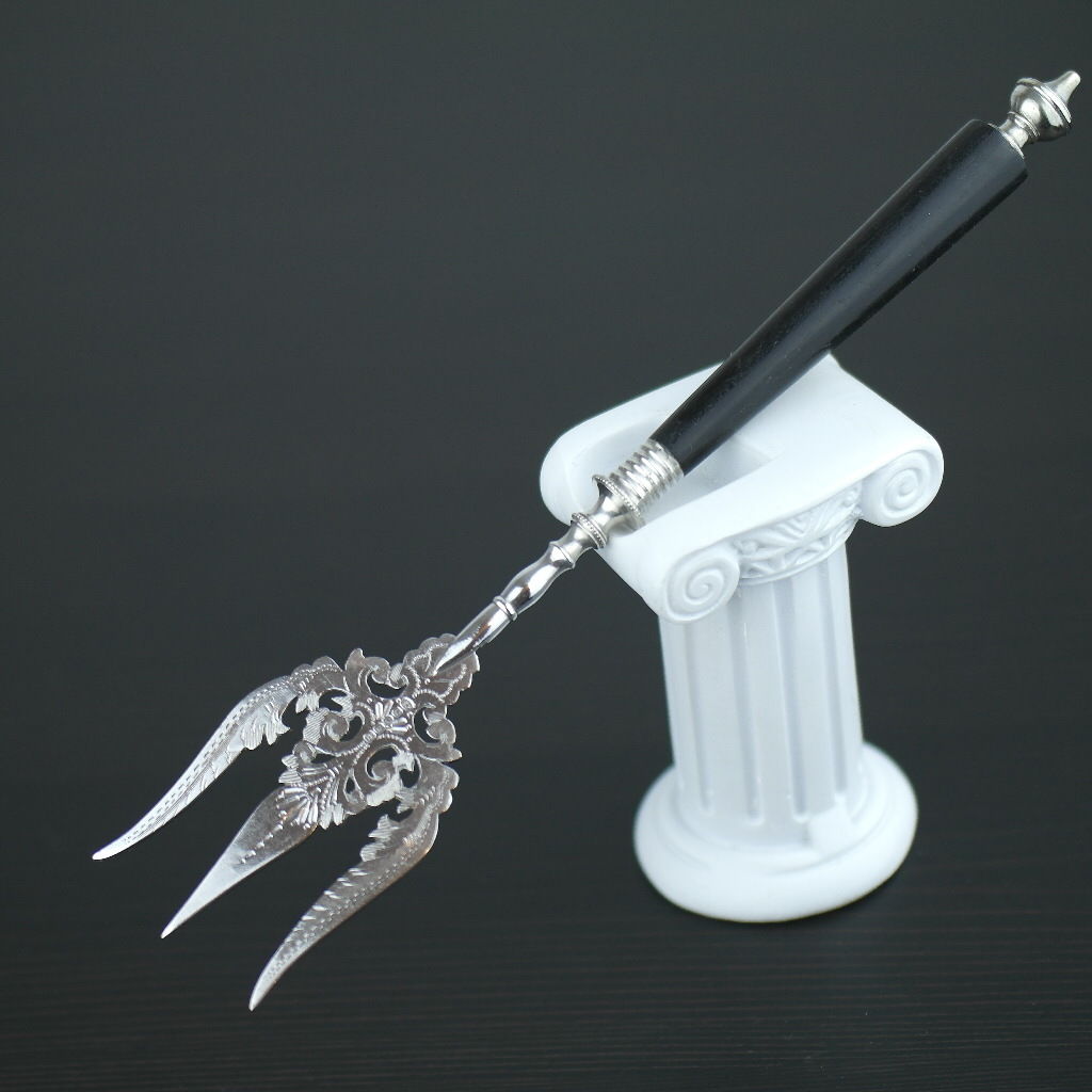 Antique silver plated fork with black solid wood handle British Empire