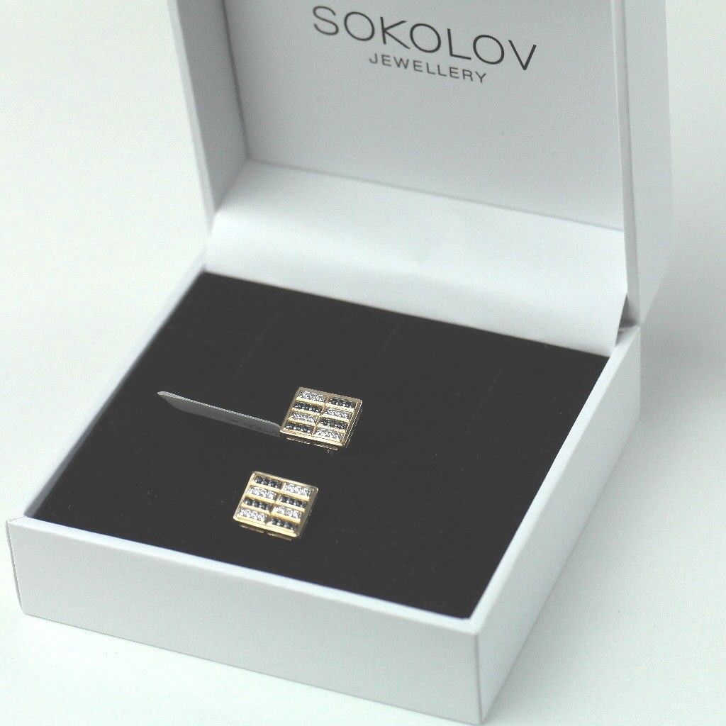 Impresionantes gemelos de oro de 14k con 48 gemas de circonita cúbica transparente y negra. 