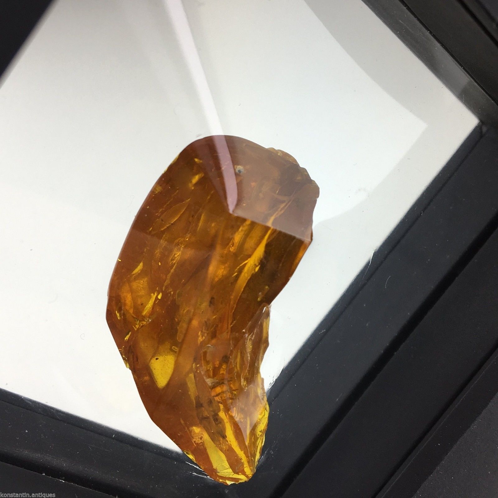 Genuine Baltic Amber stone with Inclusion in display frame