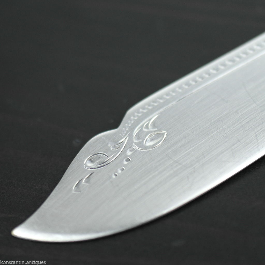 Antiguo plato de plata cuchillo de cuento madreperla mango de nácar EPNS británico