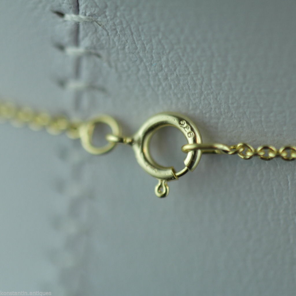 Colgante de plata de ley con oro de 18 quilates sobre corazón y cadena de diamantes