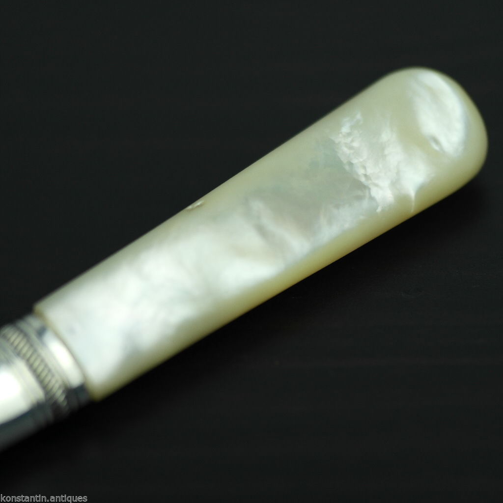 Antiguo plato de plata cuchillo de cuento madreperla mango de nácar EPNS británico