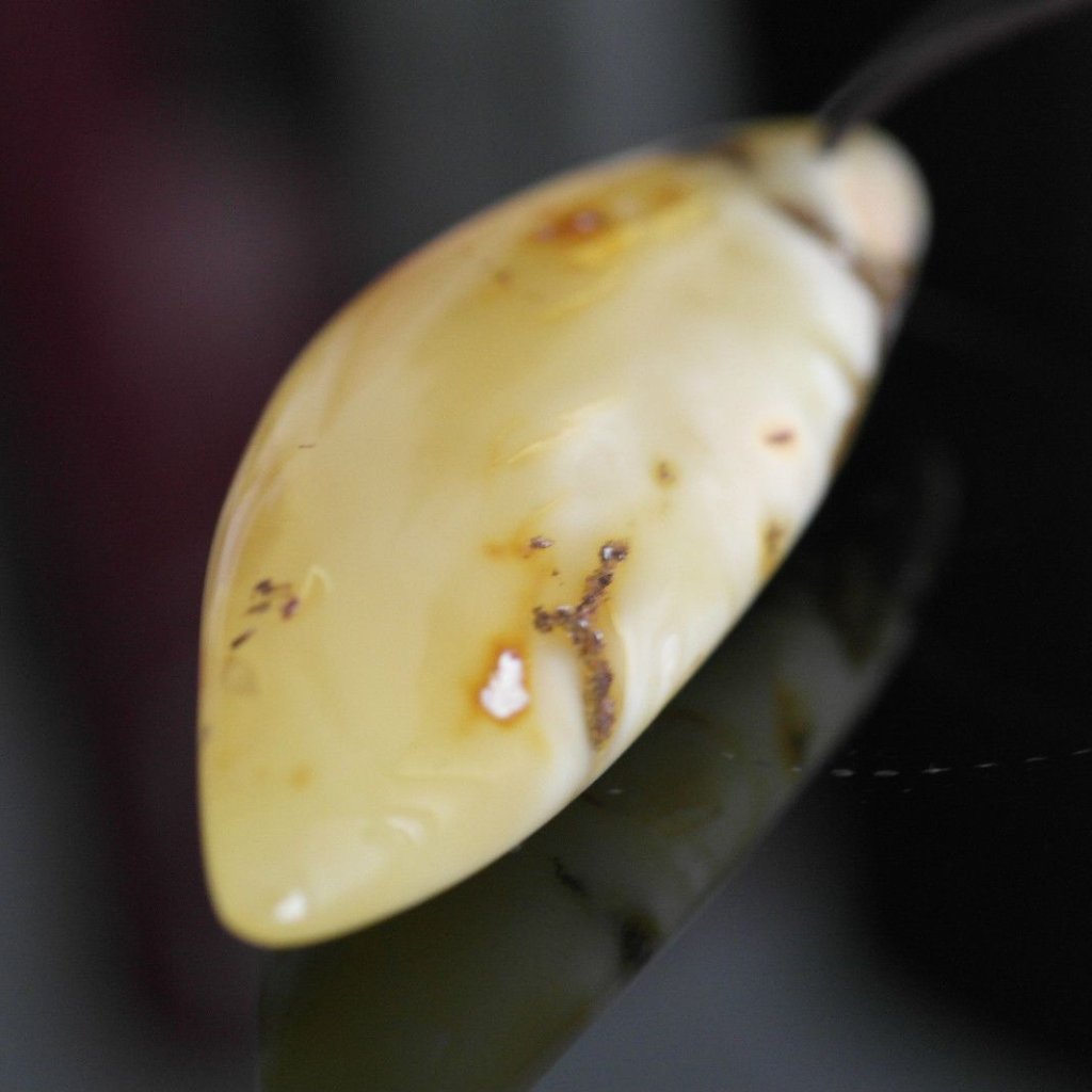 Genuine Baltic Amber handmade pendant on the rope