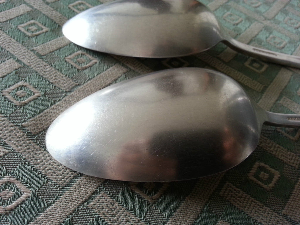 Vintage Community silver plated decorated two serving spoons British Empire