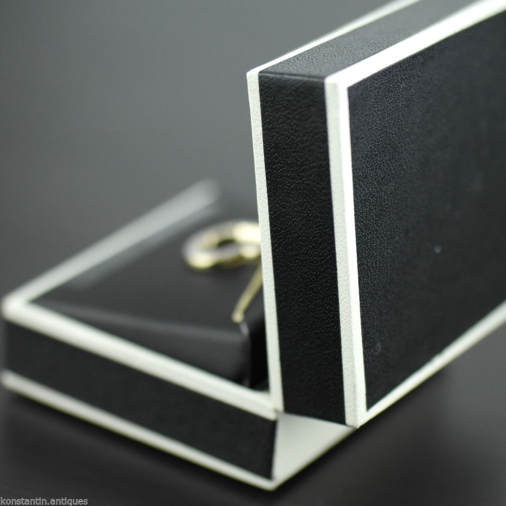 Anhänger aus 18-karätigem Gold über Herz aus Sterlingsilber mit Diamanten an einer Kette