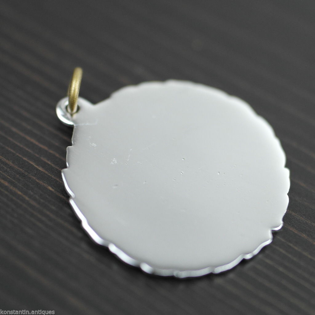 Vintage medal shield charm
