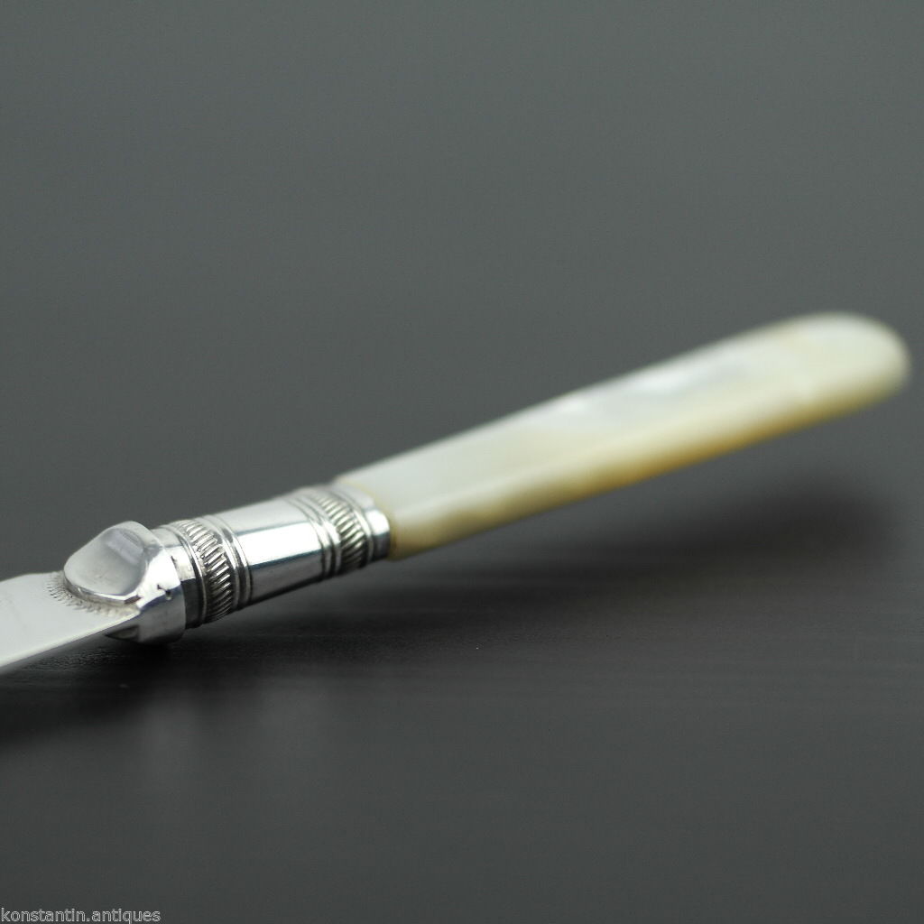 Antiguo plato de plata cuchillo de cuento madreperla mango de nácar EPNS británico