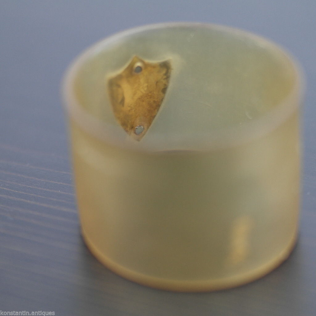 Antique Scottish horn napkin ring with solid silver shield