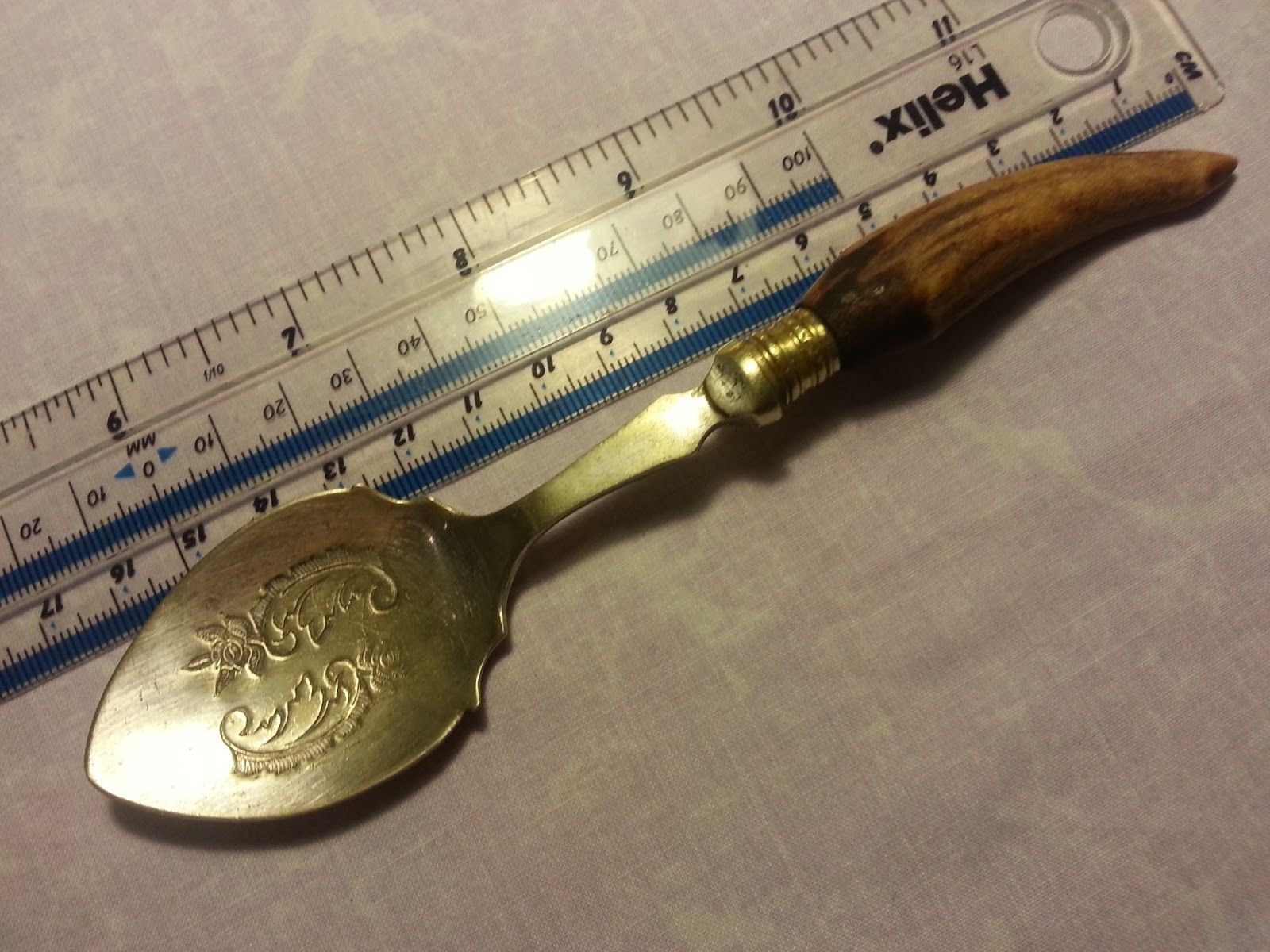 Antique silver plated ornamented dessert spoon with horn handle British Empire