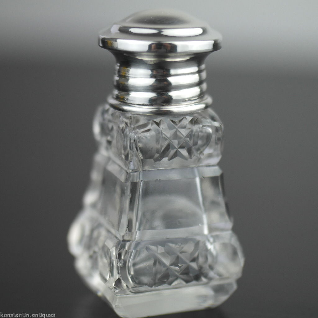 Antiguo frasco de perfume de vidrio tallado de 1931 con tapa de plata maciza