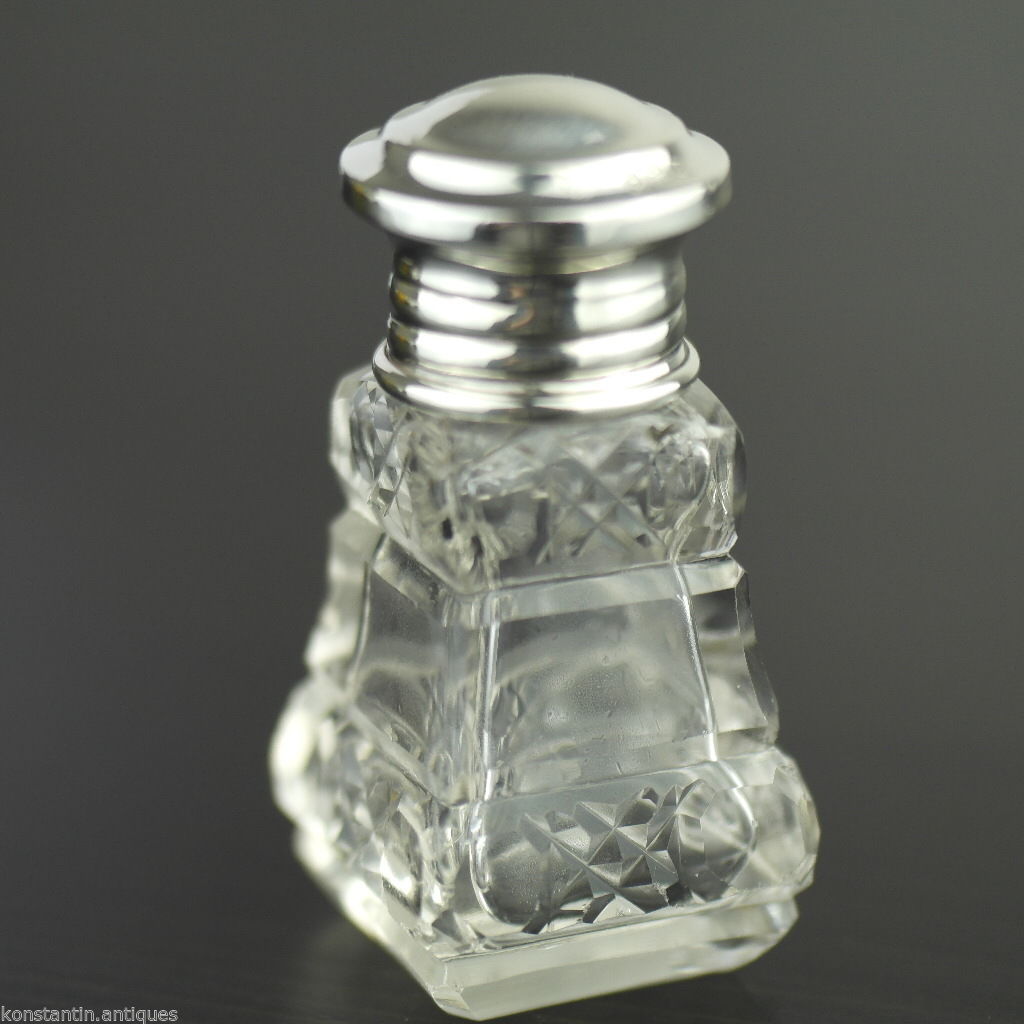 Antiguo frasco de perfume de vidrio tallado de 1931 con tapa de plata maciza