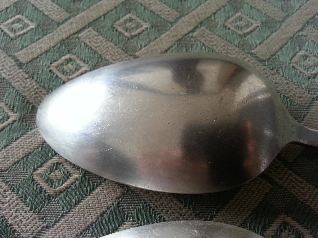 Vintage Community silver plated decorated two serving spoons British Empire