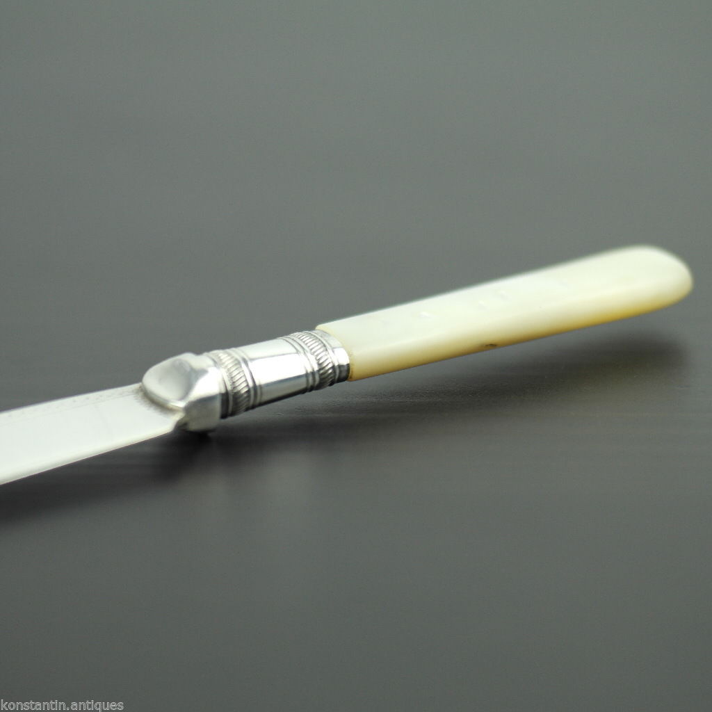 Antiguo plato de plata cuchillo de cuento madreperla mango de nácar EPNS británico