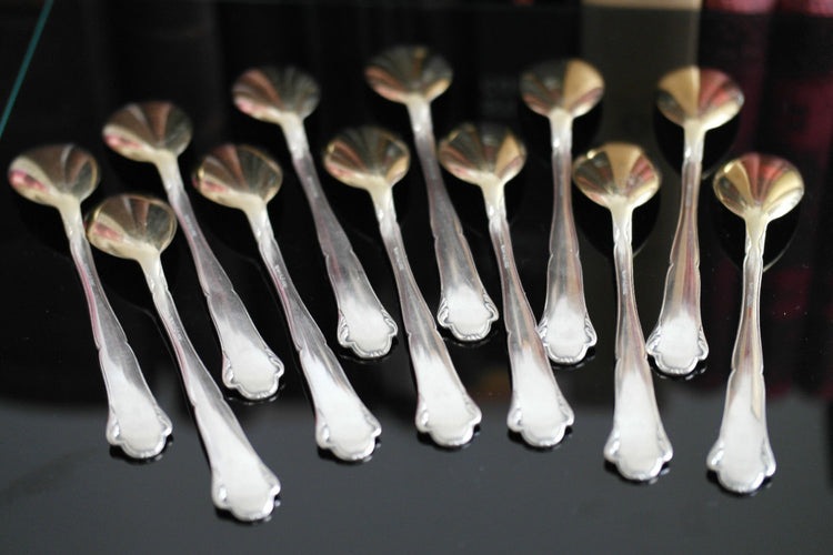 Antique gold plated solid silver set of twelve spoons WMF German