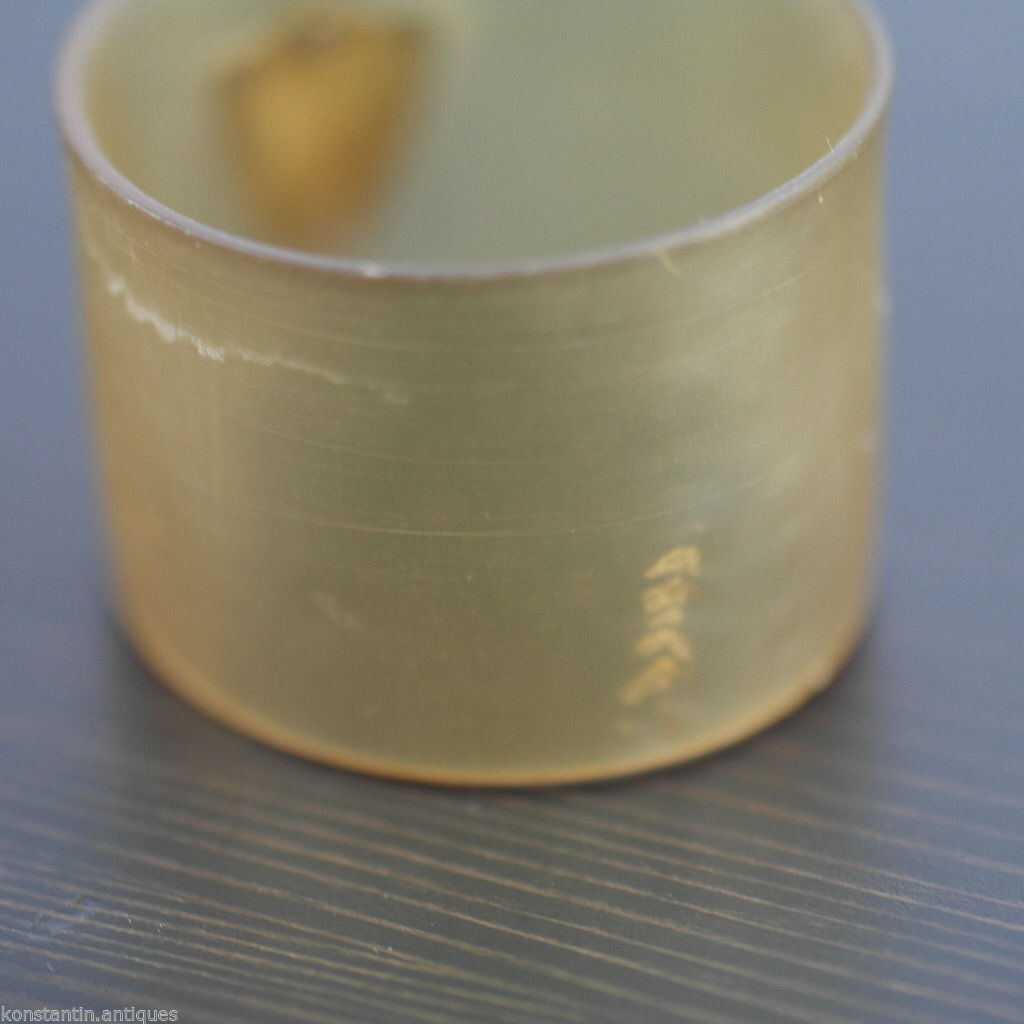 Antique Scottish horn napkin ring with solid silver shield