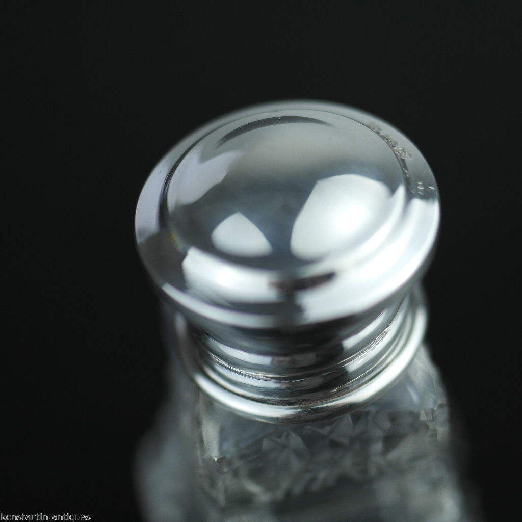 Antiguo frasco de perfume de vidrio tallado de 1931 con tapa de plata maciza