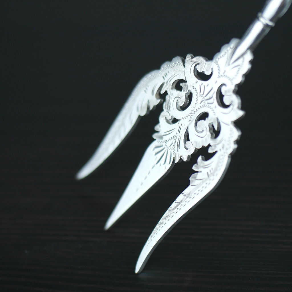 Antique silver plated fork with black solid wood handle British Empire