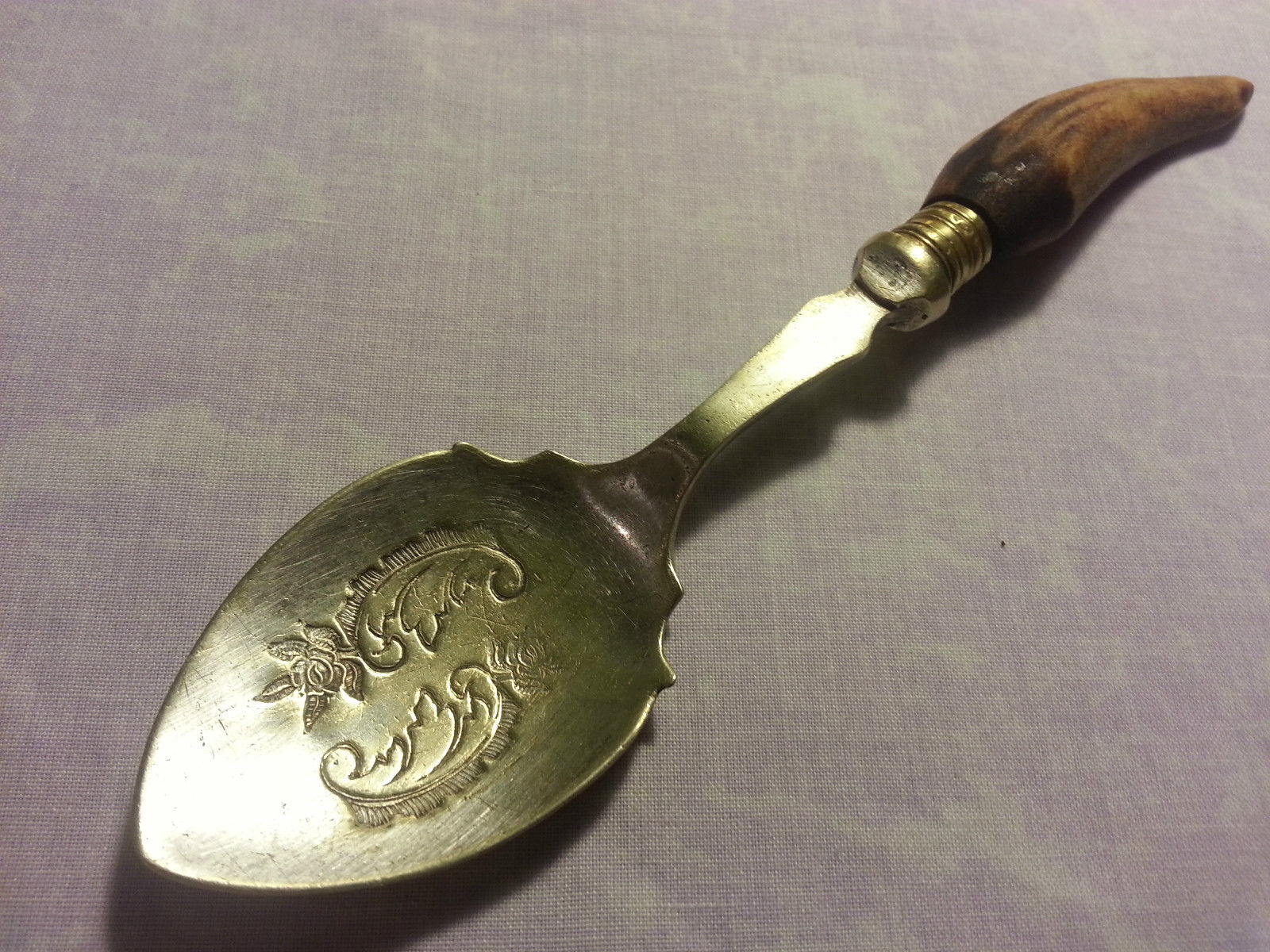Antique silver plated ornamented dessert spoon with horn handle British Empire