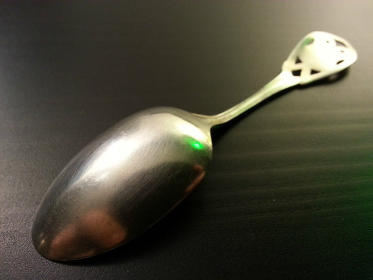Antique 20thC ornamented solid silver spoon Roden Bros LTD Canada