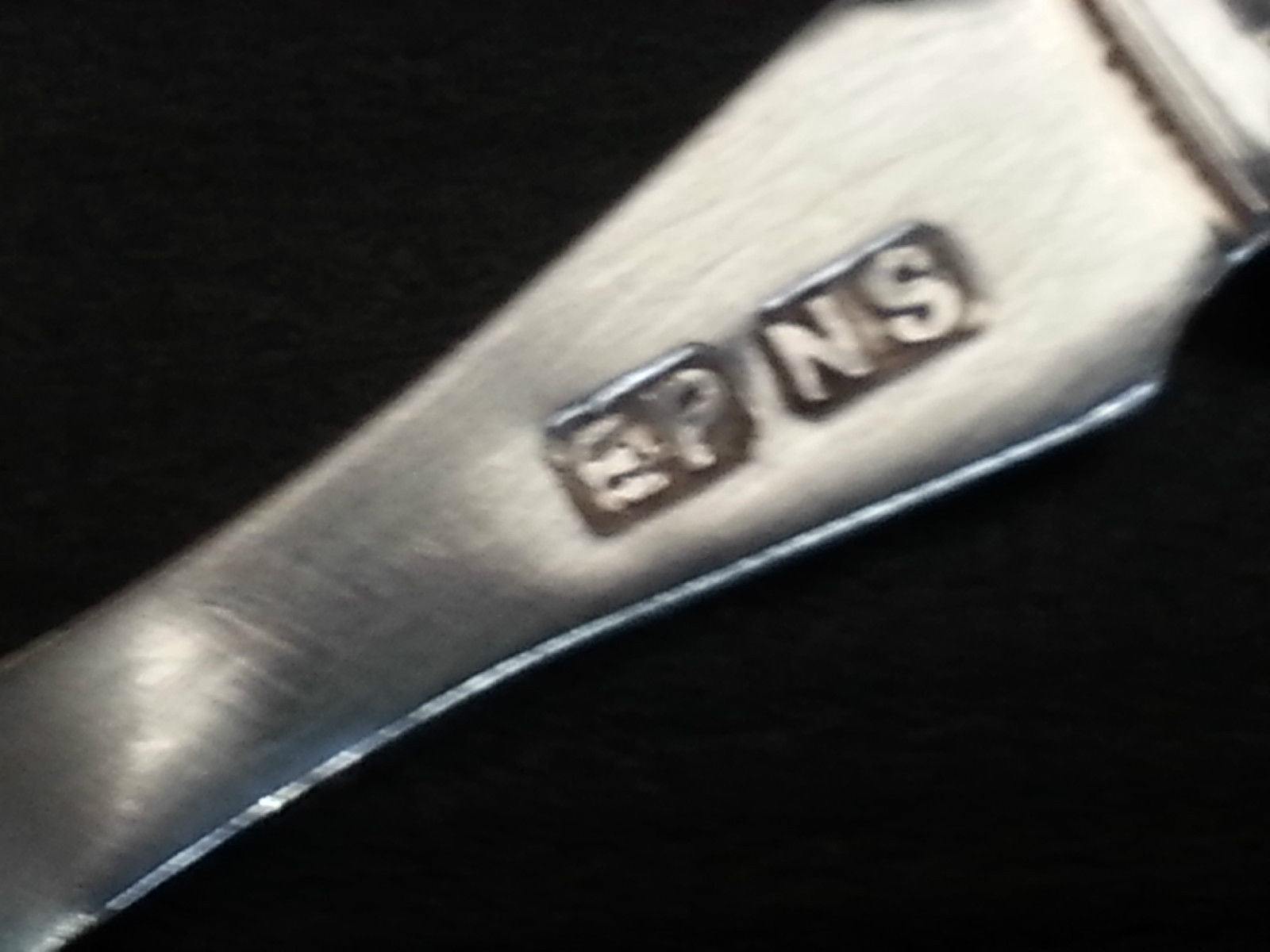 Antique silver plated dessert spoon ornamented with mother of pearl handle British Empire