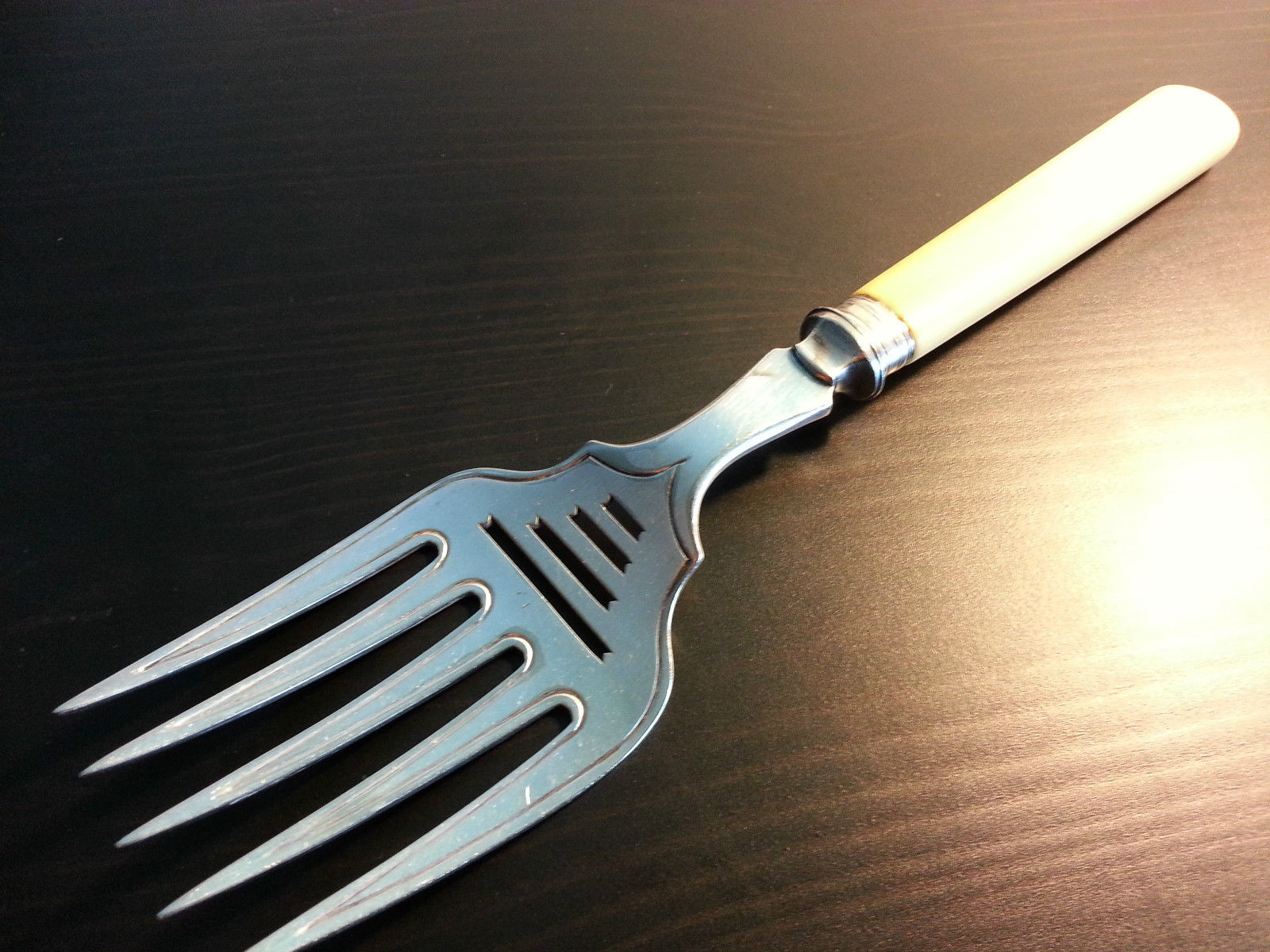 Antique silver plated ornamented serving fork British Empire