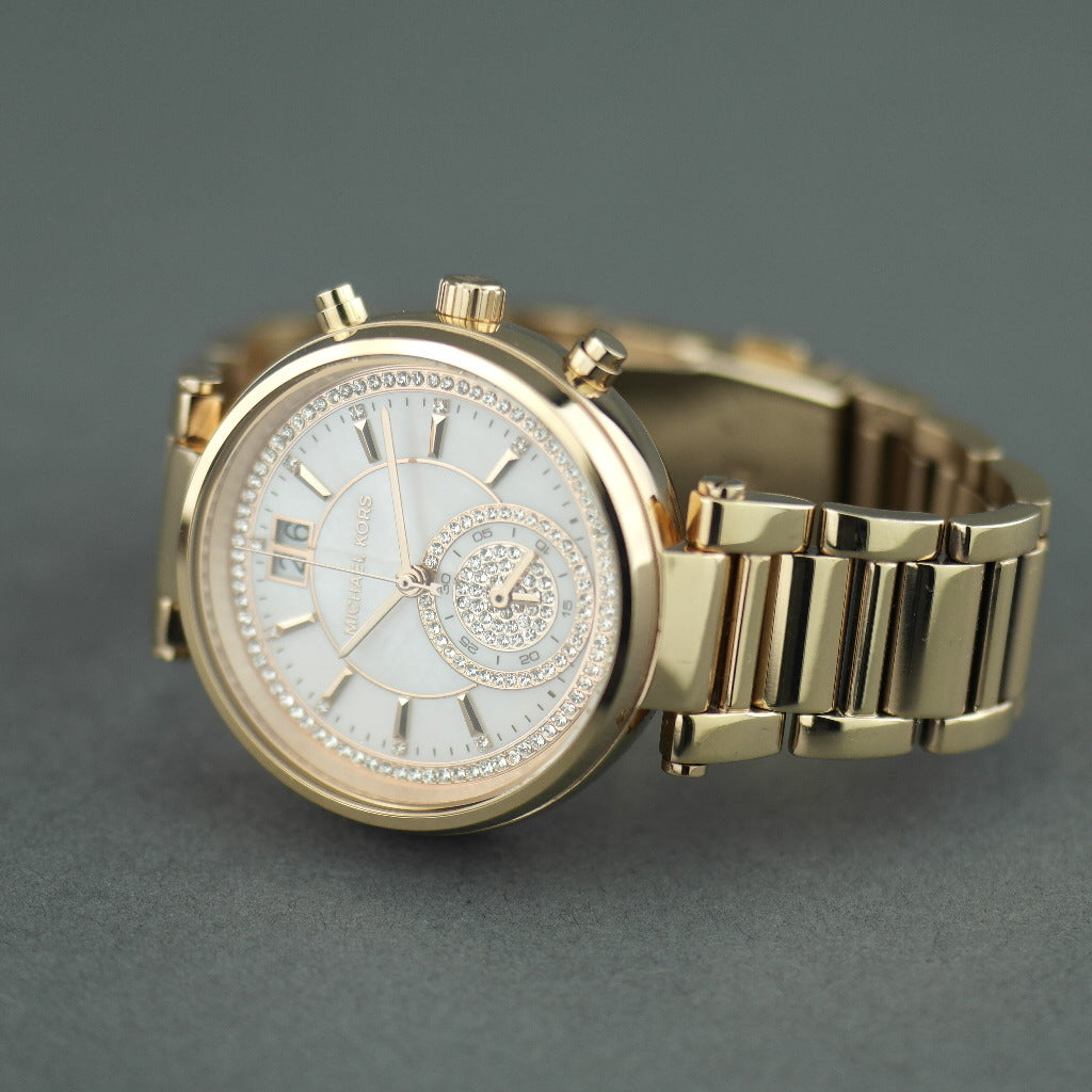 Michael Kors Sawyer Swiss made Gold Plated Ladies wristwatch with Nacre and Crystal Pave Dial