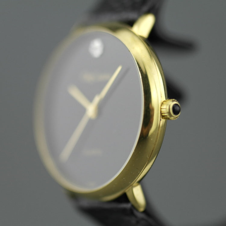 Elegante Oleg Cassini Damenarmbanduhr mit diamantvergoldetem Gehäuse und schwarzem Zifferblatt