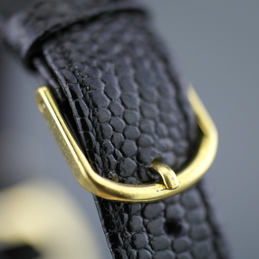 Elegante Oleg Cassini Damenarmbanduhr mit diamantvergoldetem Gehäuse und schwarzem Zifferblatt
