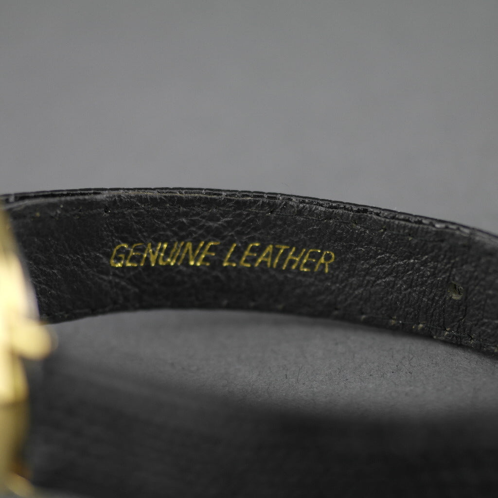 Elegant Oleg Cassini diamond gold plated case ladies wrist watch with black dial