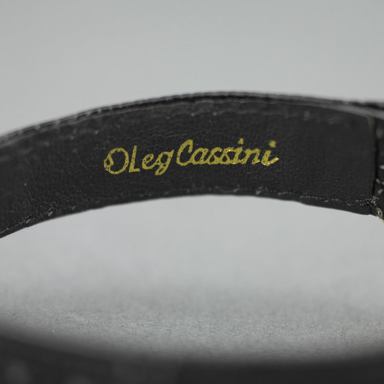 Elegante Oleg Cassini Damenarmbanduhr mit diamantvergoldetem Gehäuse und schwarzem Zifferblatt