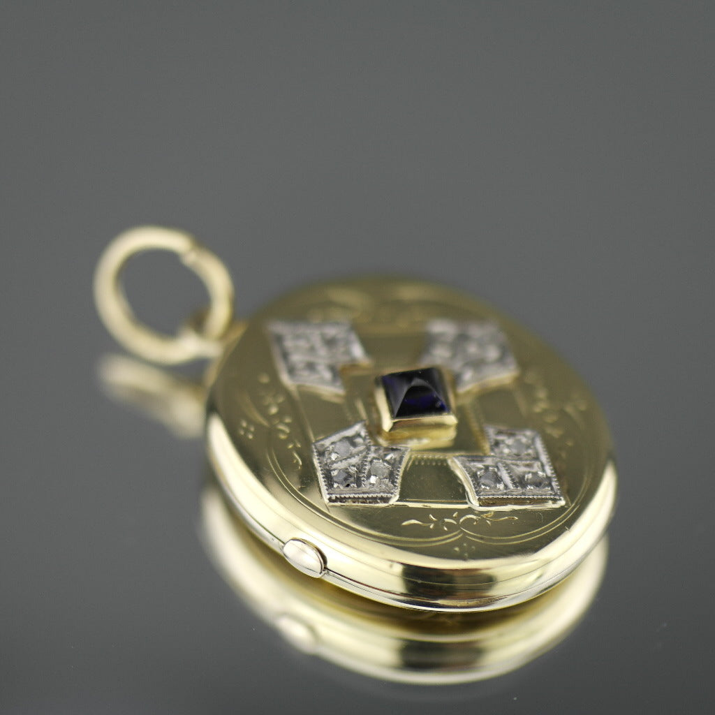 Antiguo medallón colgante de oro 56 con zafiro piramidal y 12 diamantes Imperio Ruso