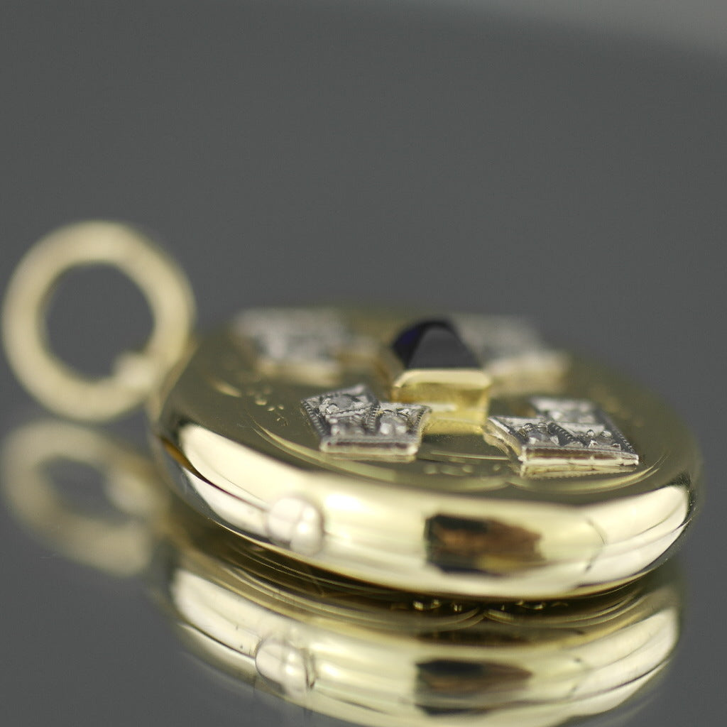 Antiguo medallón colgante de oro 56 con zafiro piramidal y 12 diamantes Imperio Ruso