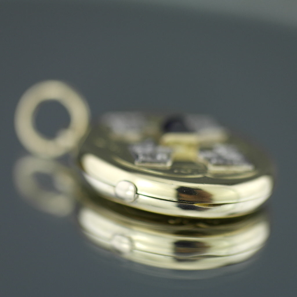 Antiguo medallón colgante de oro 56 con zafiro piramidal y 12 diamantes Imperio Ruso