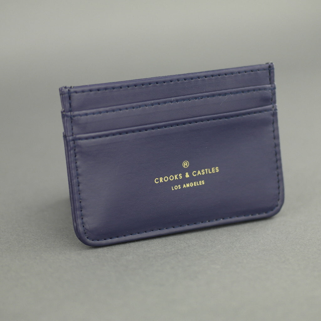 Tarjetero de cuero azul marino Bronson de Crooks &amp; Castles Los Angeles