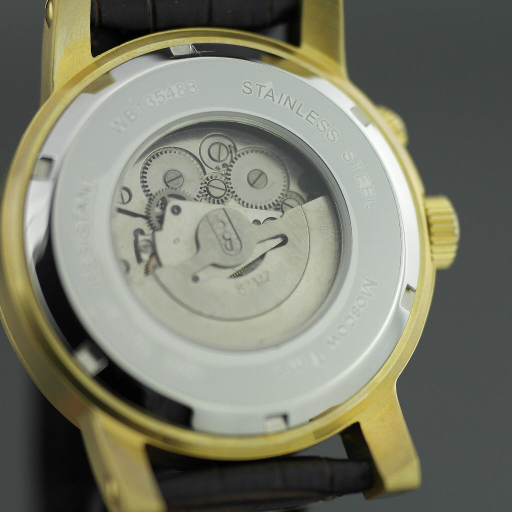 Moskauer Zeit, eine automatische Herrenarmbanduhr mit Weltzeituhr und bronzefarbenem Zifferblatt