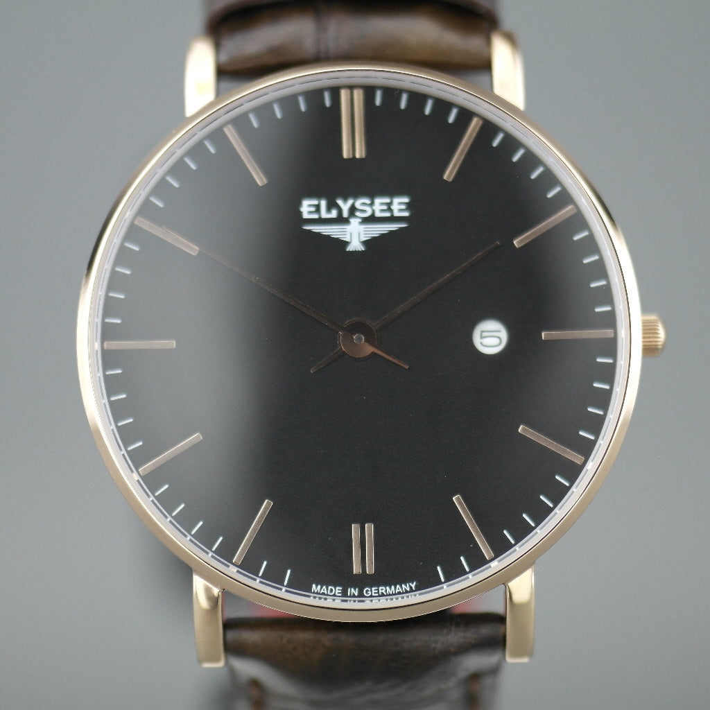 Zelos El elegante reloj plano de cuarzo chapado en oro de ELYSEE con fecha