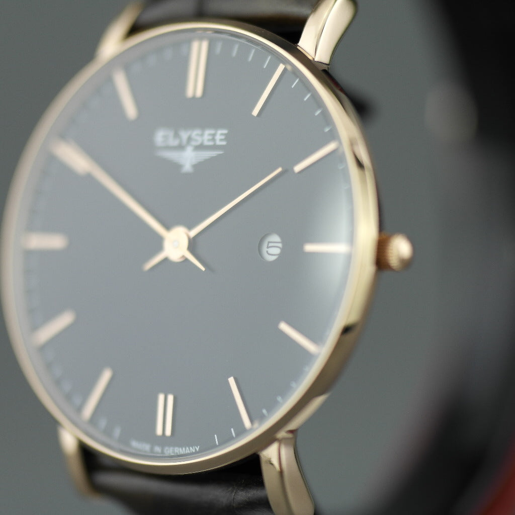 Zelos El elegante reloj plano de cuarzo chapado en oro de ELYSEE con fecha