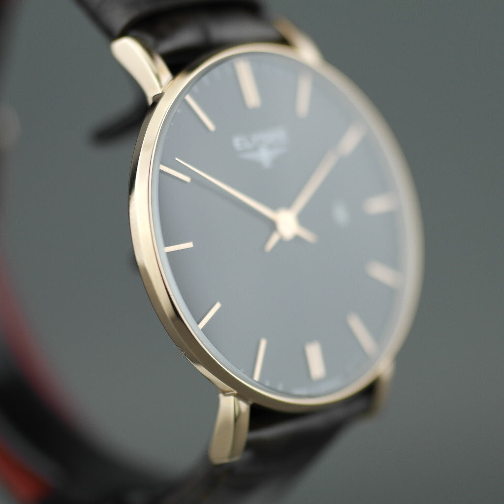 Zelos El elegante reloj plano de cuarzo chapado en oro de ELYSEE con fecha