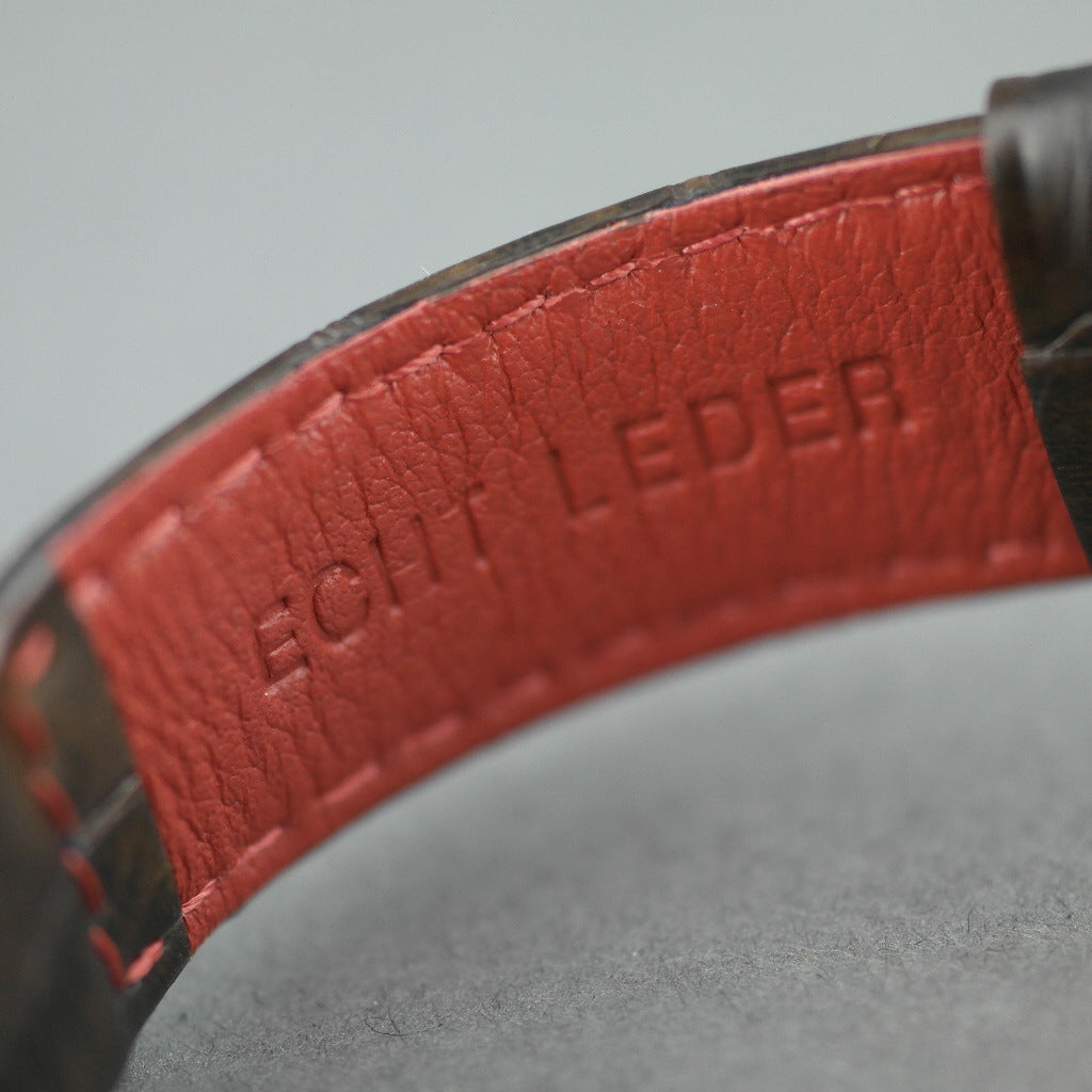 Zelos El elegante reloj plano de cuarzo chapado en oro de ELYSEE con fecha