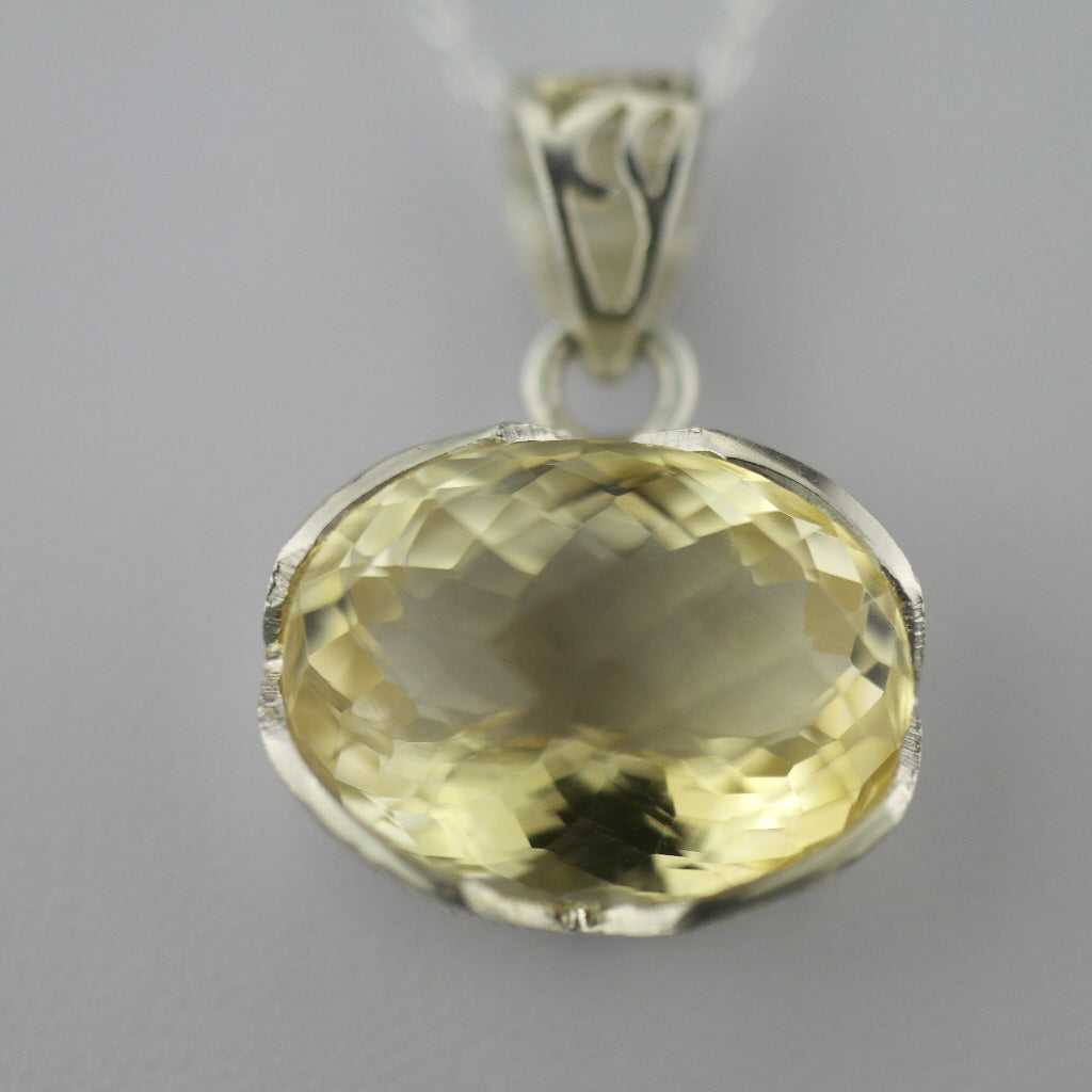 Citrine gemstone pendant with sterling silver chain from "Pomegranate"