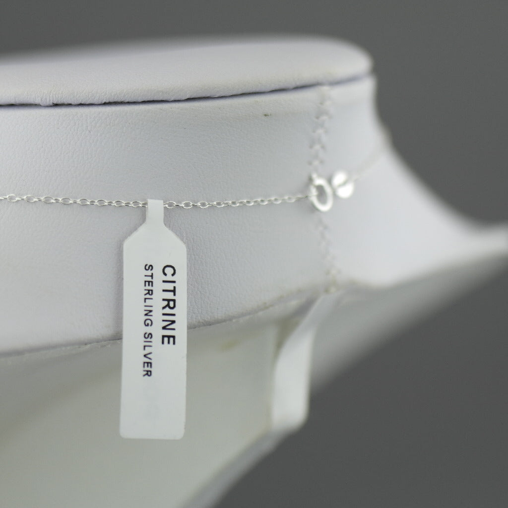 Citrine gemstone pendant with sterling silver chain from "Pomegranate"